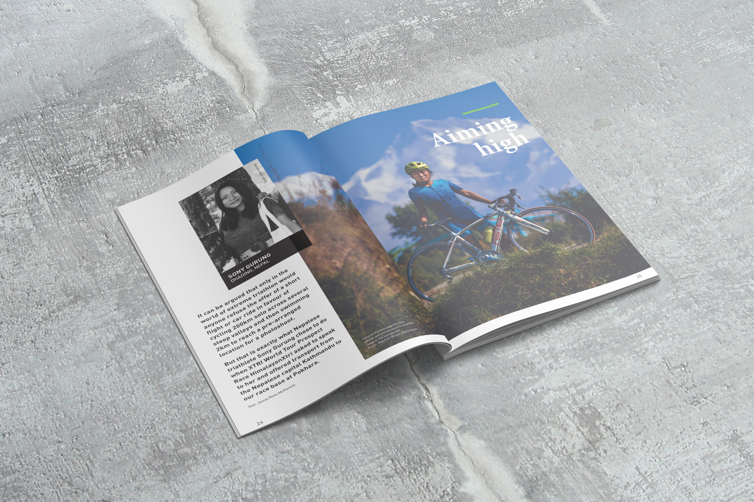 magazine open to a photo of a woman with a bicycle